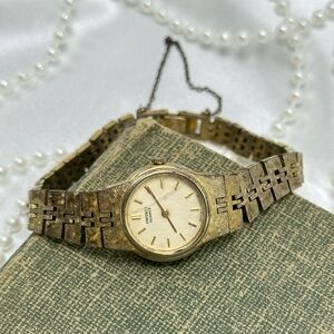 Dainty Gold Round Dial Seiko Watch